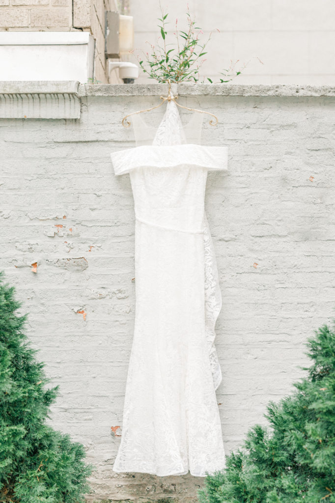 Bridal Gown hanging in backyard