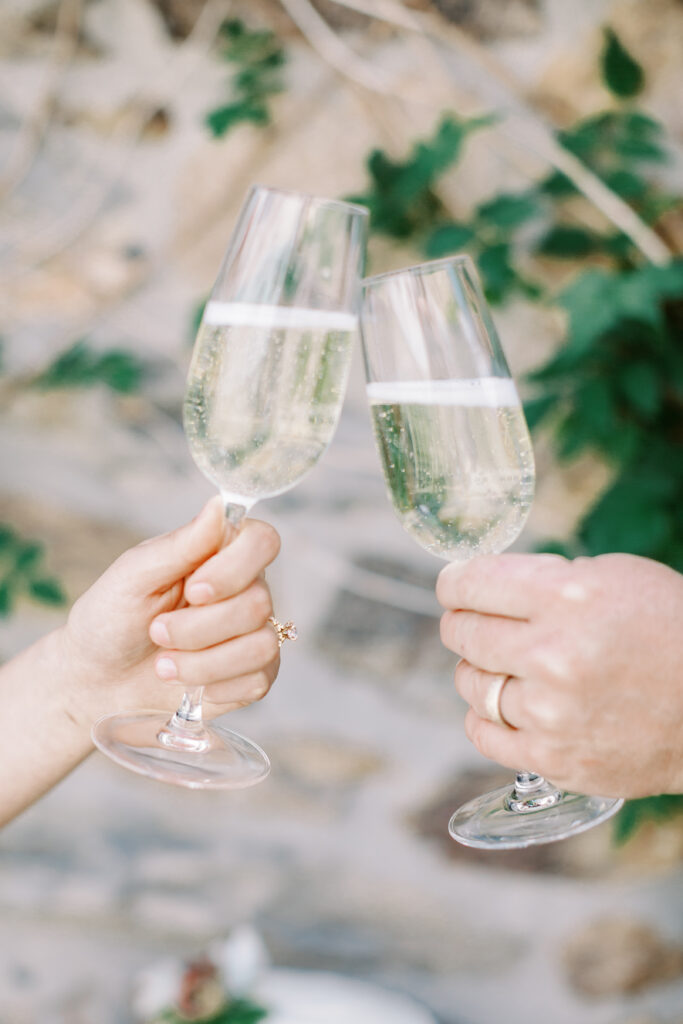 couple toast champagne at Lauxmont Farms in Pennsylvania