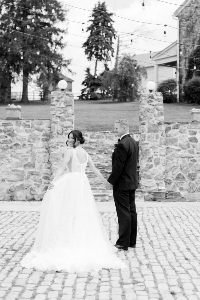 Bride and groom depart from the courtyard at Lauxmont Farms in Wrightsville, PA